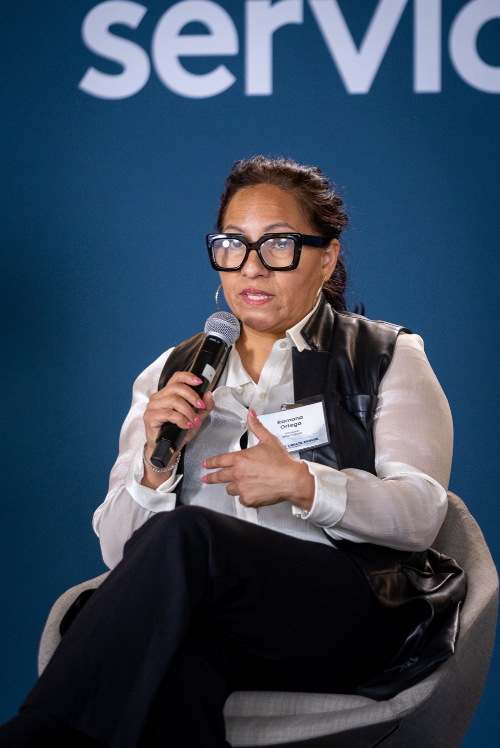 Ramona Ortega, J.D., speaking on stage